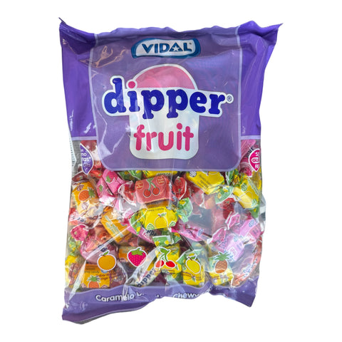 Golosinas Dipper Fruit. Caramelo blando masticable con zumo de frutas. Sabores frutales: piña, limón, naranja, fresa y cereza. Bolsa de 1kg.